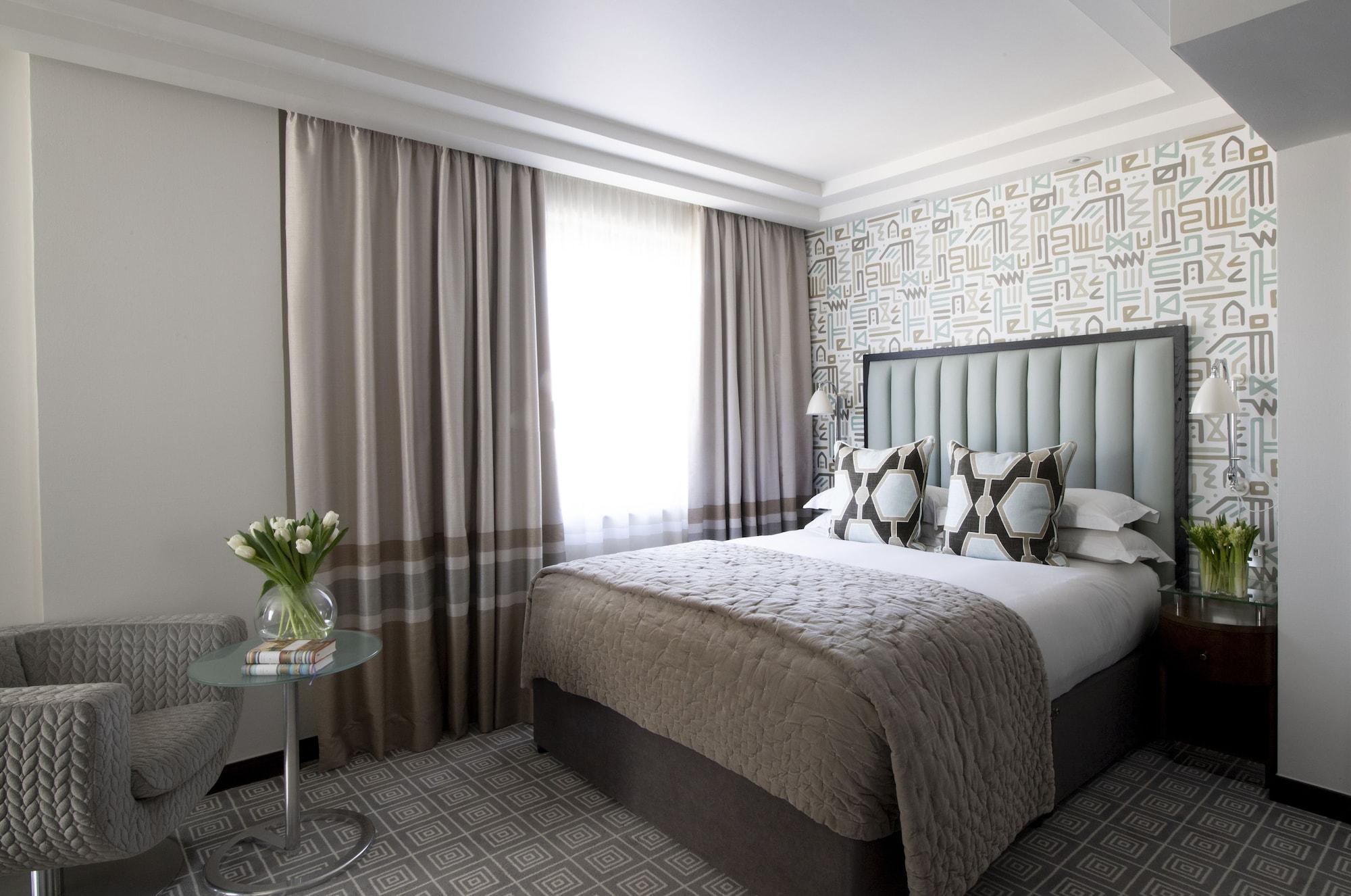 ザ メリルボーン ホテル ロンドン エクステリア 写真 A bedroom at the hotel
